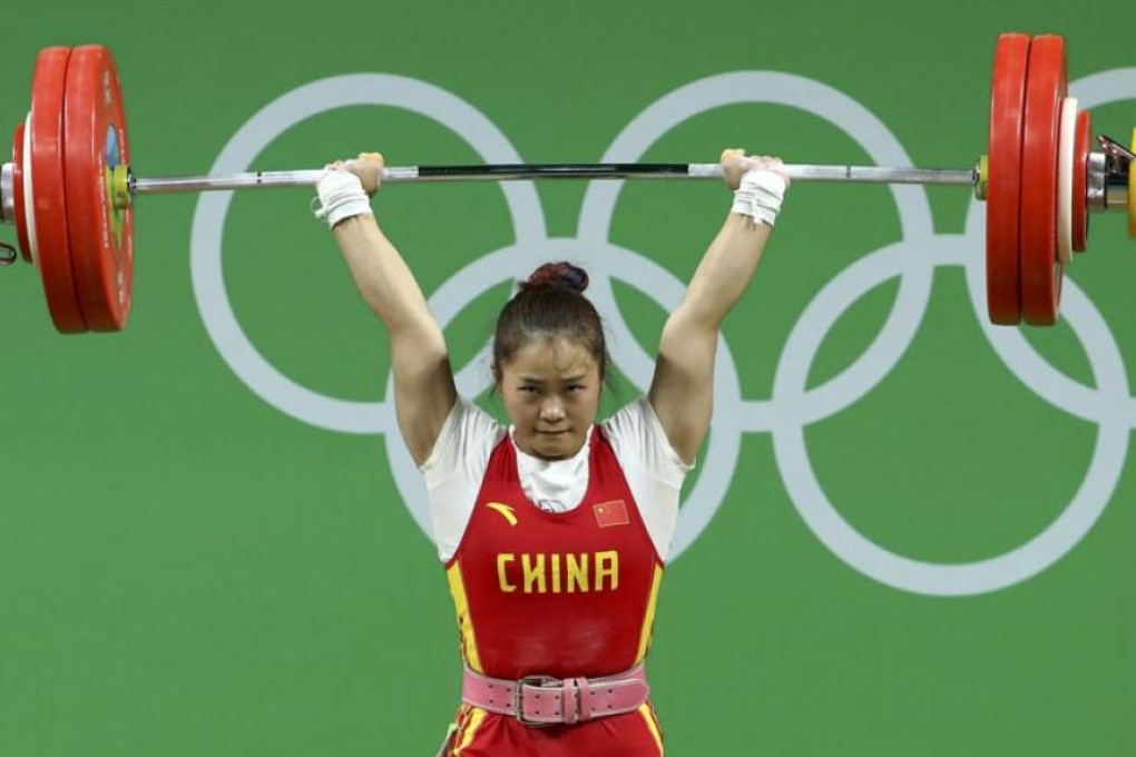 Weightlifting gold medallist Deng Wei of China competes in the final of the women’s 63kg category in Rio on Tuesday. Photo: Reuters