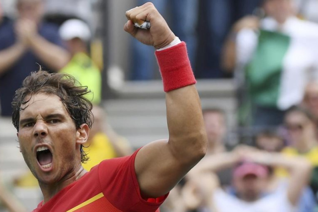 Spaniard Rafael Nadal celebrates after defeating Gilles Simon of France in Rio on Thursday. Photo: Reuters