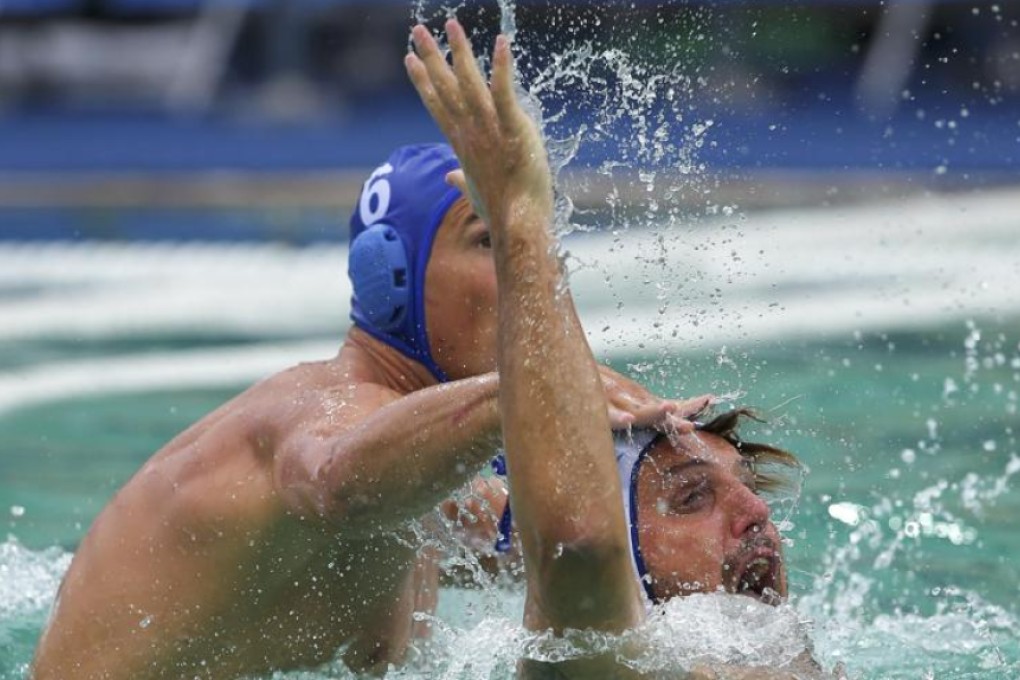 The water polo pool at the Maria Lenk Aquatics Centre had taken on a distinct green hue by Thursday, and the resulting chemical clean-up was causing athletes’ eyes to burn, according to Hungary’s Gergo Zalanki (right). Photo: Reuters