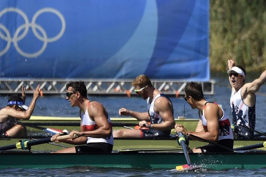Britain’s Matt Langridge (right) leads the celebrations as Team GB win the men’s eight final gold medal at Lagoa stadium in Rio on Saturday. Photo: AFP