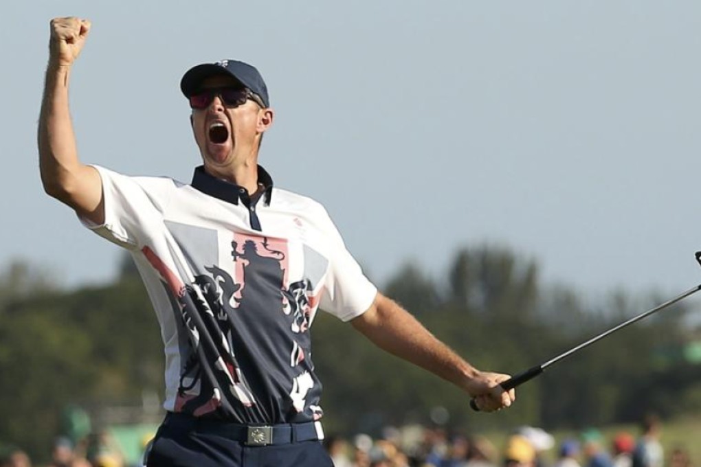 Justin Rose of Team GB celebrates his gold medal victory in the men’s golf competition at the Rio Olympics on Sunday. Photo: Reuters
