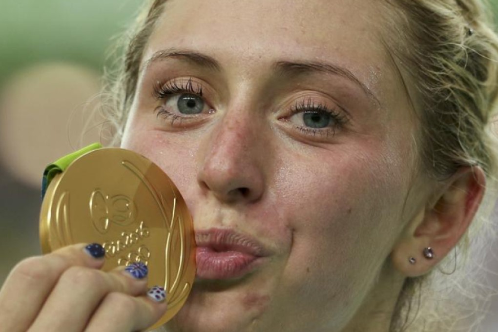 Women’s omnium winner Laura Trott of Team GB celebrates her victory at the Olympic Velodrome on Tuesday. Photo: Reuters