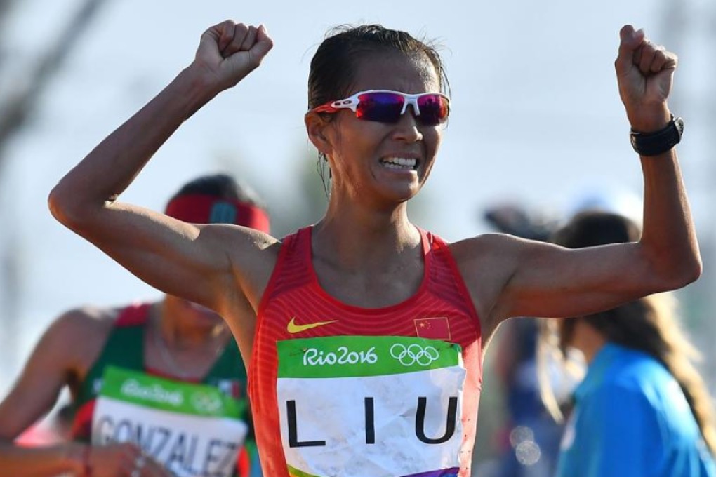 China’s Liu Hong celebrates winning the women’s 20k race walk during the athletics event at the Rio 2016 Olympic Games in Pontal, Rio de Janeiro on Friday. Photo: AFP