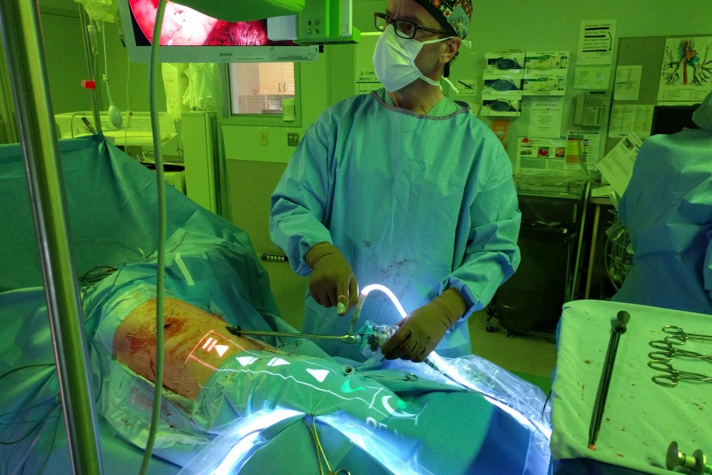 Surgeon James Bond uses NZ Technologies’ Tipso interface during an operation at Surrey Memorial Hospital. Photo: Submitted