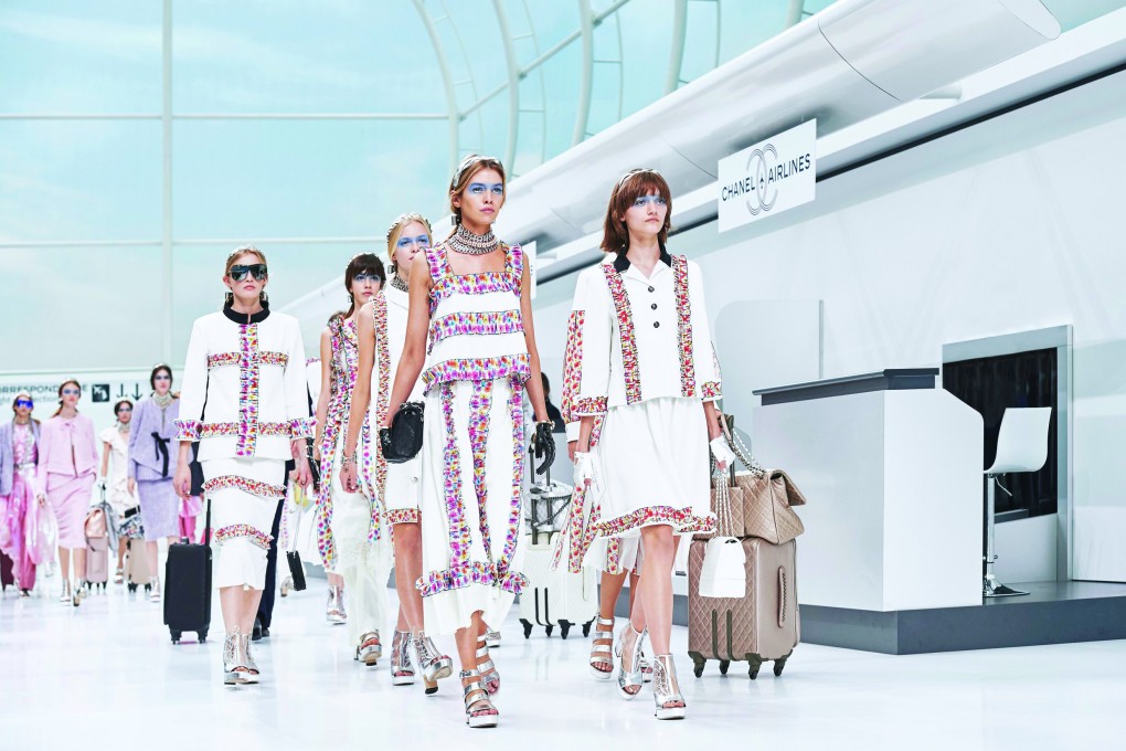 Chanel 2015 Paris fashion week show had a chic airport lounge theme.