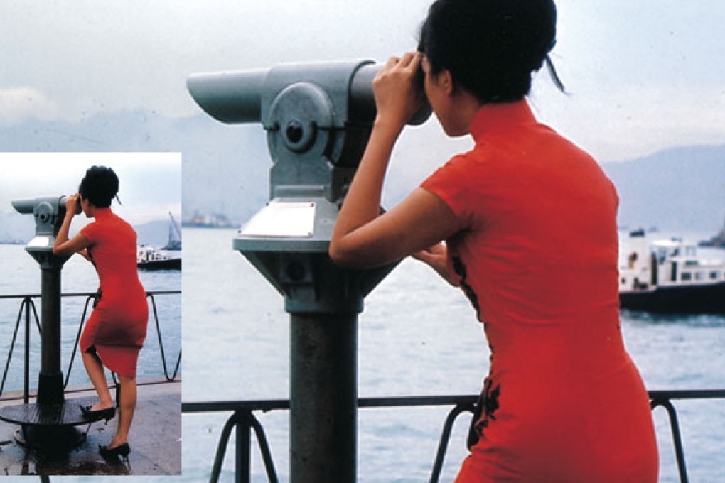 A woman looks across Victoria Harbour in the 1960s