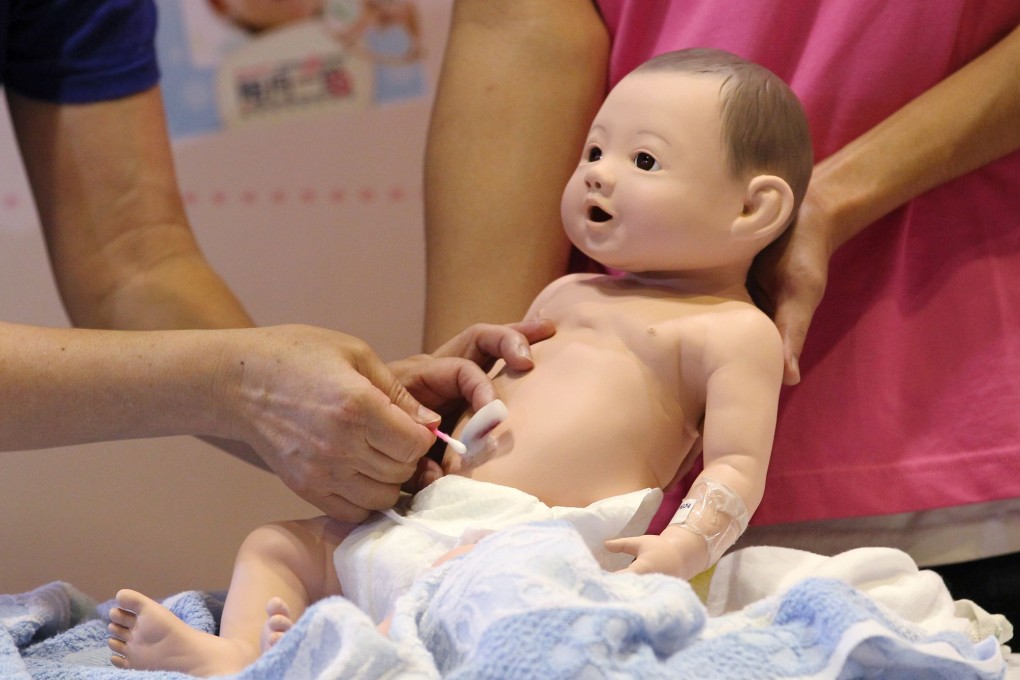 Grandparents may soon be taught how to change baby diapers in a government-funded training course. Photo: Nora Tam/SCMP