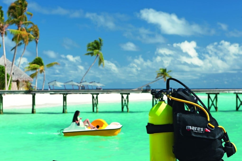 Take a dip in the sapphire waters at Constance Halaveli.