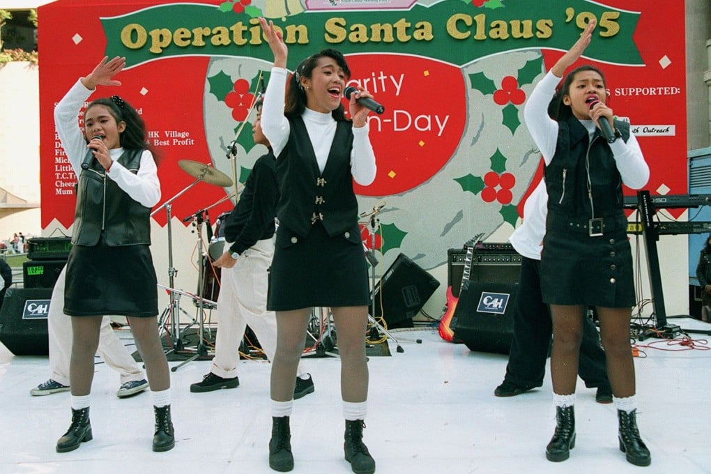 Simple Youth, a group of young Filipino singers, performs on stage at the Operation Santa concert in 1995. Photo: Mark Ralston/SCMP