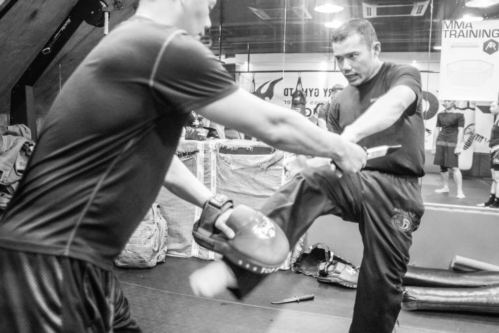 Derek Poon teaching. Photo: Rock Wong