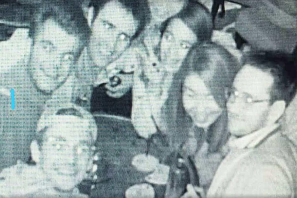 A CCTV screenshot of a group of diners taking a selfie, some of whom later appeared to skip out on the bill.
