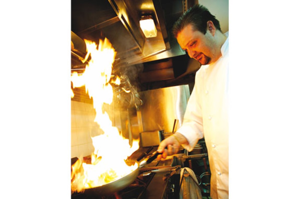 Chef at work: Francesco fires it up in prep for Goccia's wine tasting