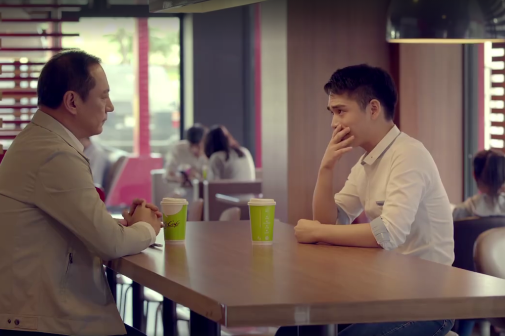 In the video, the man comes out to his father in a McCafé. For some reason. (Video: McDonald's)
