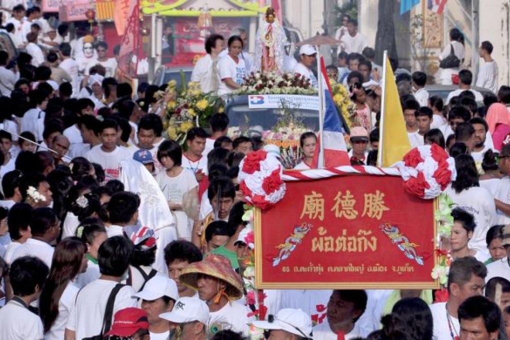 Phuket Vegetarian Festival - seek out the veggie food, avoid the sharp objects