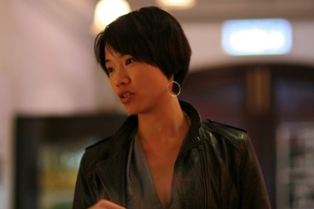 Artist Sze C. speaks at her moon cup exhibition. Photo: Supplied