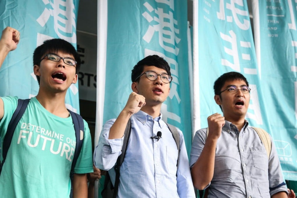 Nathan Law Kwun-chung (middle) is one of Hong Kong's newest lawmakers. Photo: Sam Tsang / SCMP