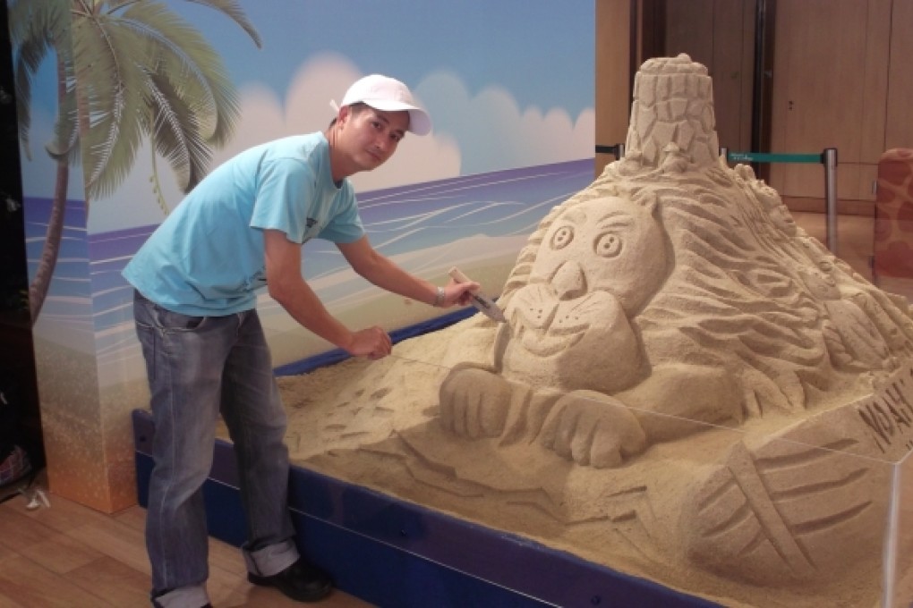 Sand sculpture artist Chris Shum