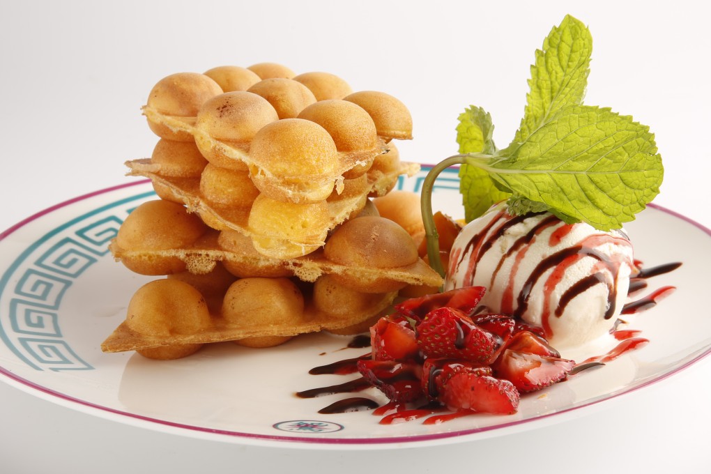 Dig in to this devilish-looking eggette with ice cream at Yuan Yang Café.