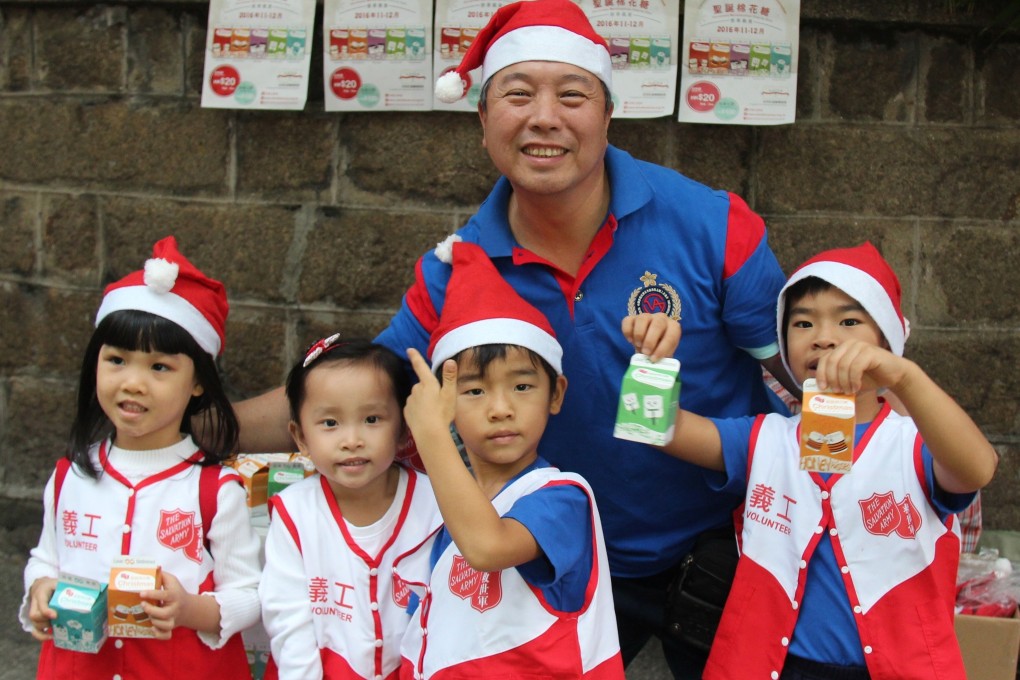 Volunteers get ready to sell marshmallows at the Christmas street sale event organised by the Salvation Army.  Photo: Handout
