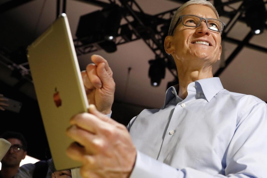 Tim Cook, CEO, holds an iPad Pro after his keynote address to Apple's annual world wide developer conference (WWDC) in San Jose, California. Photo: Stephen Lam/Reuters