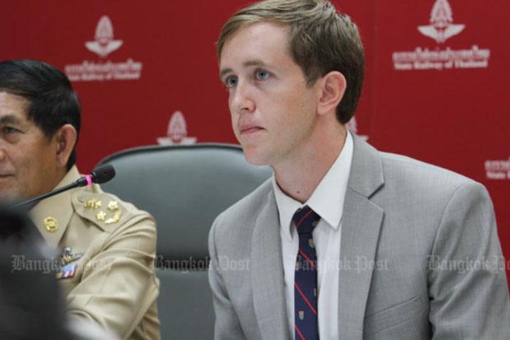 Nathan Bartling speaks to the press at the State Railway of Thailand's head office in Bangkok on Monday. Photo: Benjapol Amornjiansak/Bangkok Post