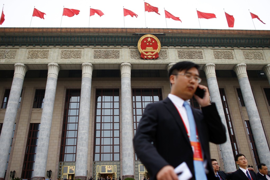 Delegates outside the Great Hall of the People in Beijing. Photo: Reuters