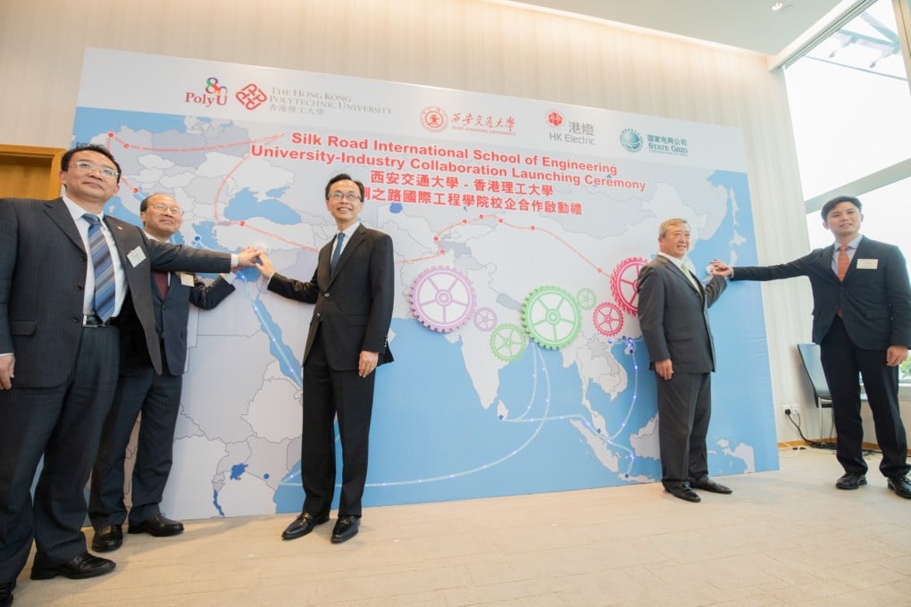 Mr Patrick NIP Tak-kuen, Secretary for Constitutional and Mainland Affairs (centre), together with (from left) Professor XI Guang, XJTU Vice President; Mr WAN Chi-tin, Managing Director, HK Electric; Mr CHAN Tze-ching, PolyU Council Chairman; and Mr LI Ming, Division Director, State Grid Corporation of China, officiate the launching ceremony of the collaborated workshop in electricity and energy for nurturing talents for the Belt and Road region.