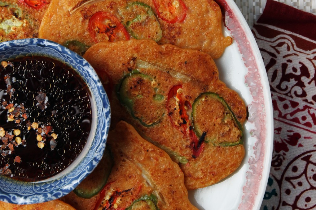 Korean kimchi pancakes. Photo: Jonathan Wong