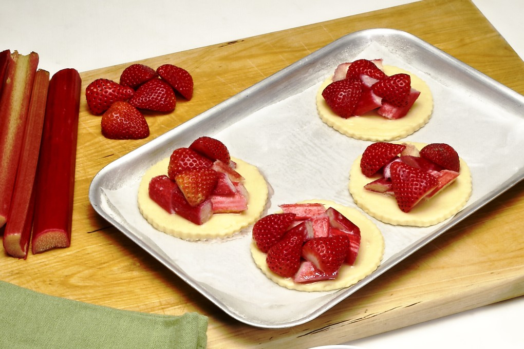 Summer dessert recipes: strawberry and rhubarb galettes, lemon posset, and chocolate trifle with ladyfingers, berries and chocolate cream