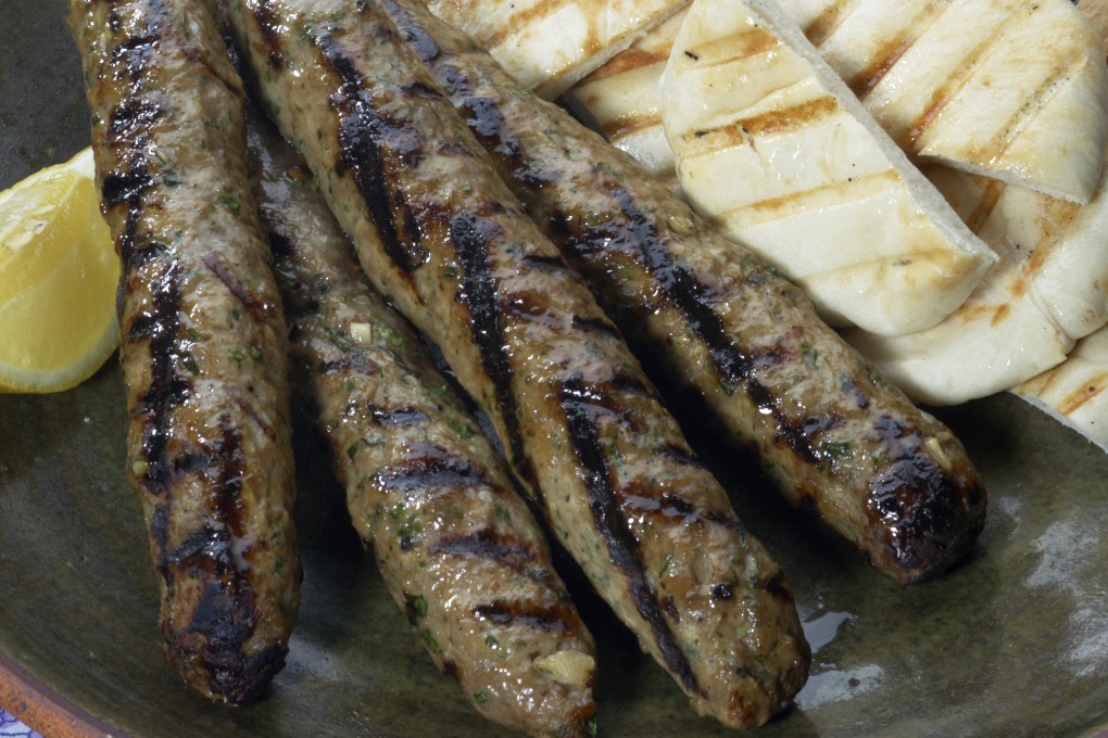Minced lamb kebabs with cucumber mint dressing. Photo: Jason Bonello