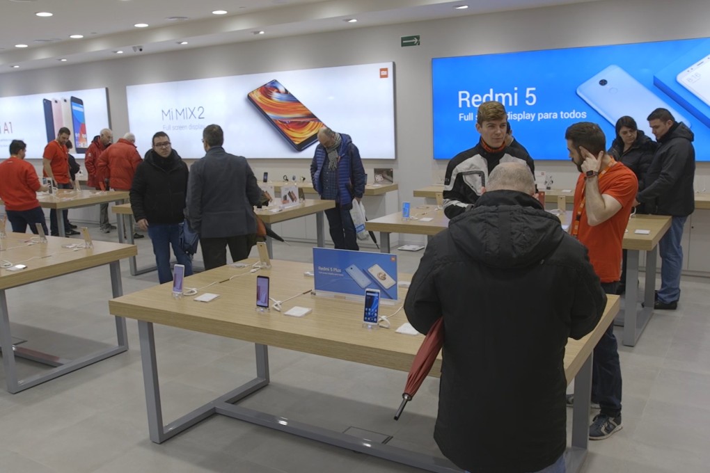 Smartphones on display at Xiaomi's new store in Barcelona, Spain