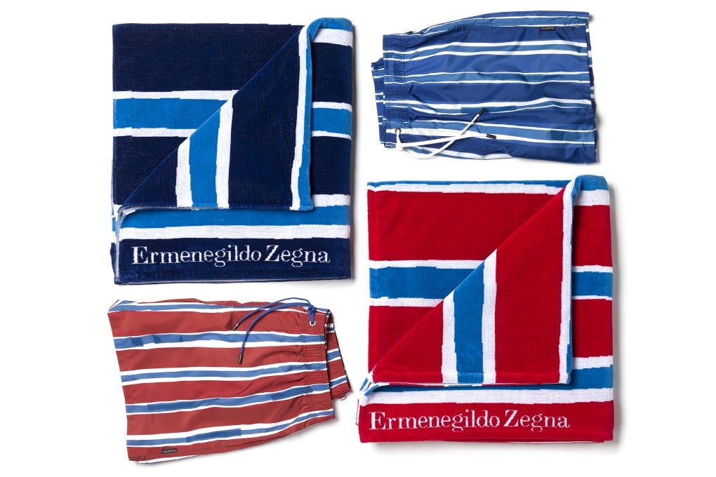 Beach towels and swim shorts from the new Ermenegildo Zegna Beachwear collection in bold Baiadera stripes.