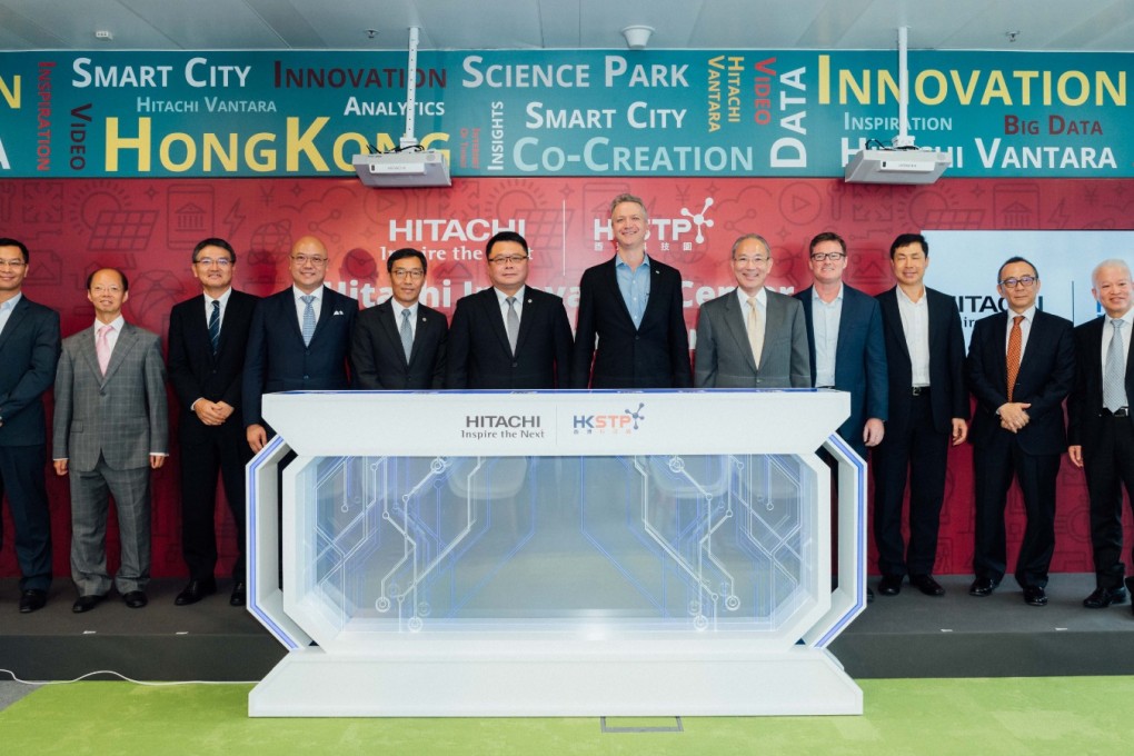(From fourth left) Charles Ng (Associate Director-General of Investment Promotion, Invest Hong Kong); Albert Wong (CEO, HKSTP); Dr. Sunny Chai, (Chairman, HKSTP); Brian Householder (CEO, Hitachi Vantara); Kuninori Matsuda, (Japanese Ambassador & Consulate-General to HK); Andrew Sampson (VP & GM – HK, Macau and Taiwan, Hitachi Vantara)