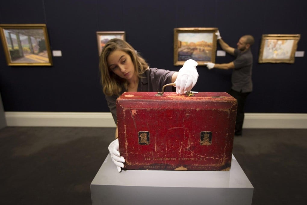 Churchill's Morocco dispatch box (left) and painting The Weald of Kent Under Snow.Photos: Agencies