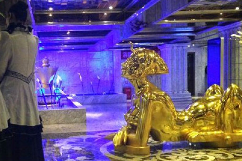 A Fuzhou  property administrator was suspended after photos of him grabbing a barmaid’s breasts were widely circulated online. Photo: SCMP pictures