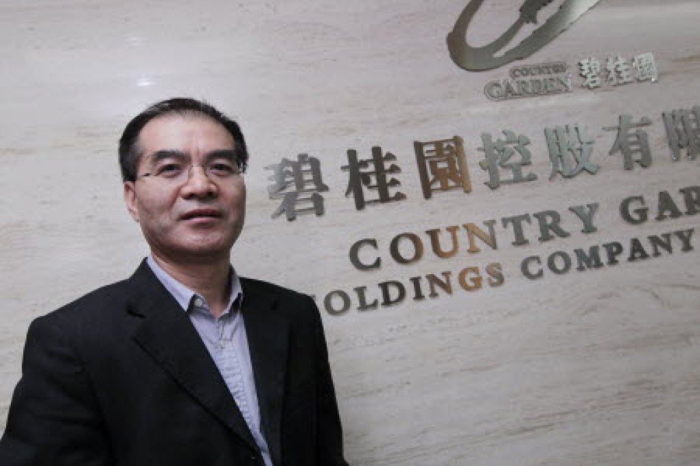Chief financial officer Wu Jianbin plans to halve financing costs in the next two years. Photo: Bruce Yan