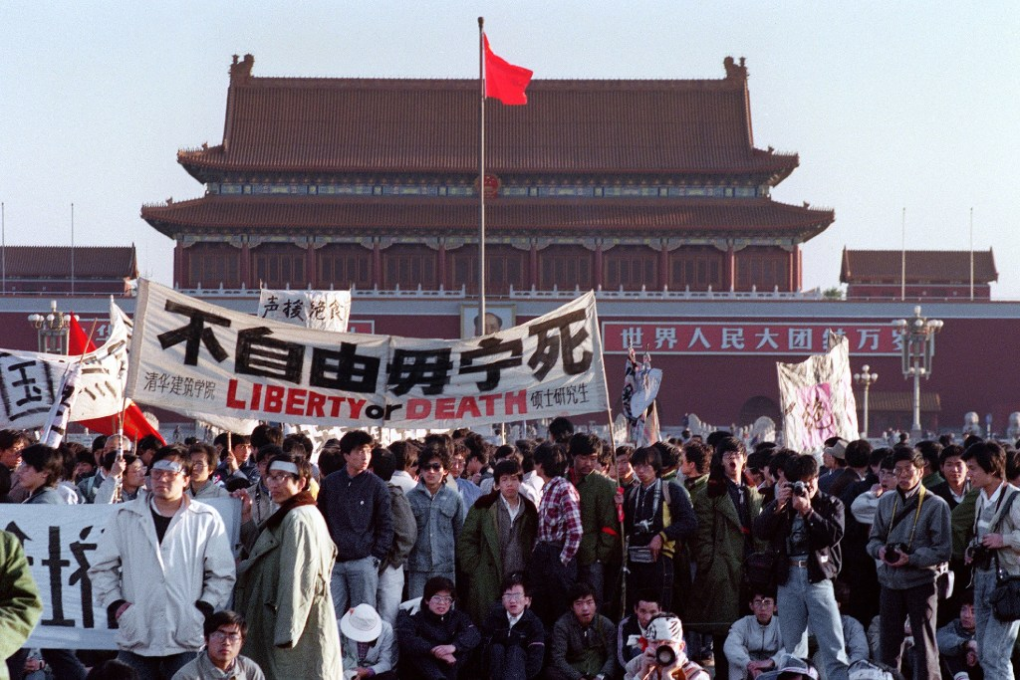 Activists gathered at Tiananmen Square on May 14th, 1989, after an overnight hunger strike. The seven-week protests ended in a military crackdown on June 4th. (Picture: Catherine Henriette/AFP)