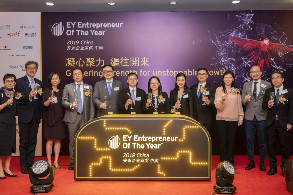 At the launch ceremony of the EOY China Programme in Hong Kong, top executives and key facilitators of the programme join hands with representatives from various supporting organisations and partners.