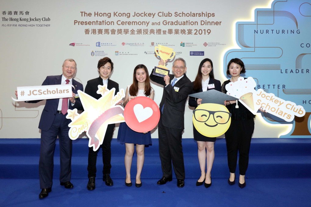 Club Chairman Dr Anthony W K Chow (3rd right), Chief Executive Officer Winfried Engelbrecht-Bresges (1st left) and Jockey Club Scholars.