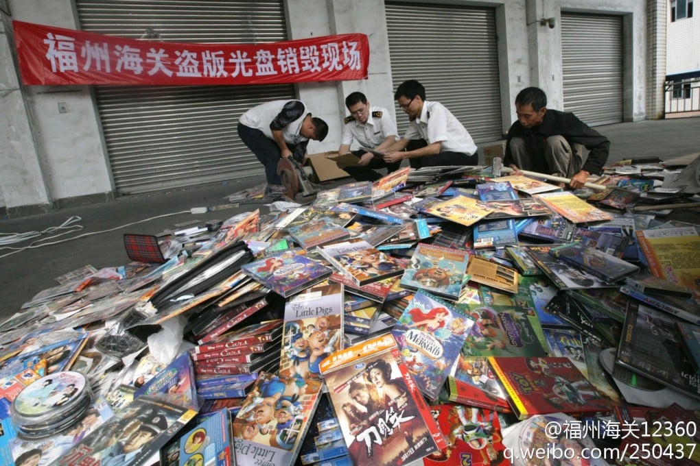 Every year, China has to destroy a ton of pirated DVDs. (Picture: Weibo/Fuzhou Customs)