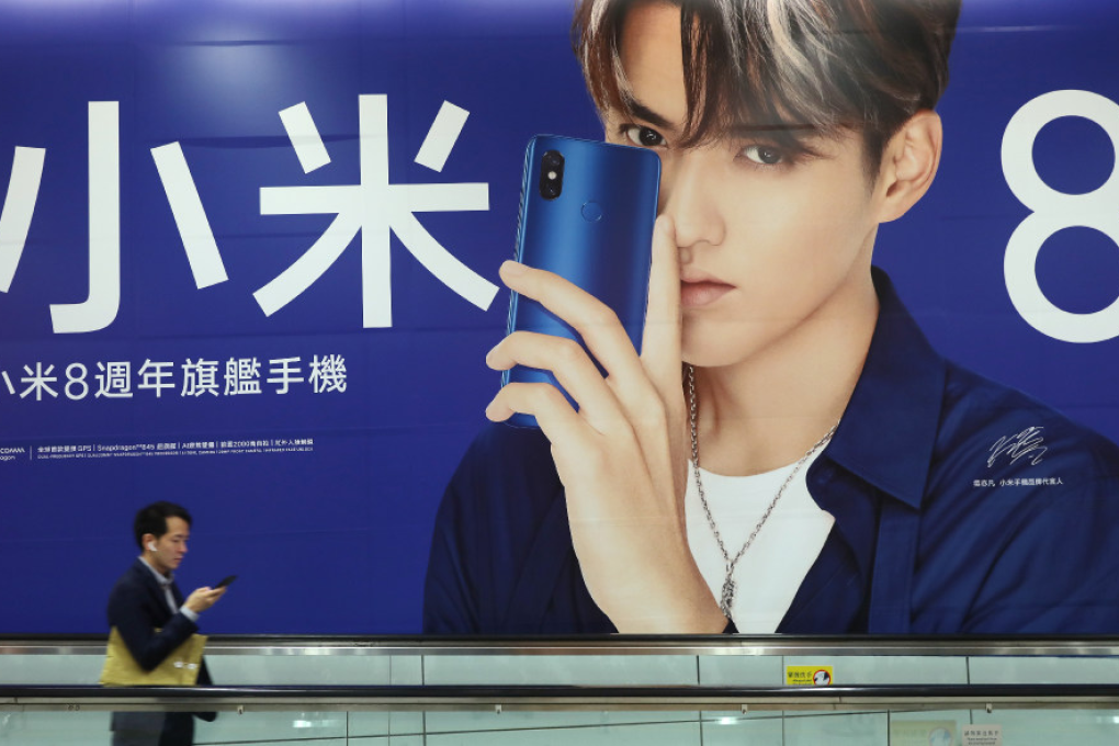 A Xiaomi billboard advertisement featuring Chinese-Canadian rapper Kris Wu. (Picture: Sam Tsang/SCMP)