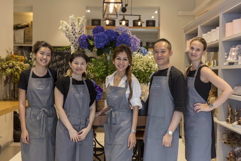 Lelian Chew (centre), founder of Singapore company, The Floral Atelier – which uses the cloud accounting platform, Xero – with members of her team.