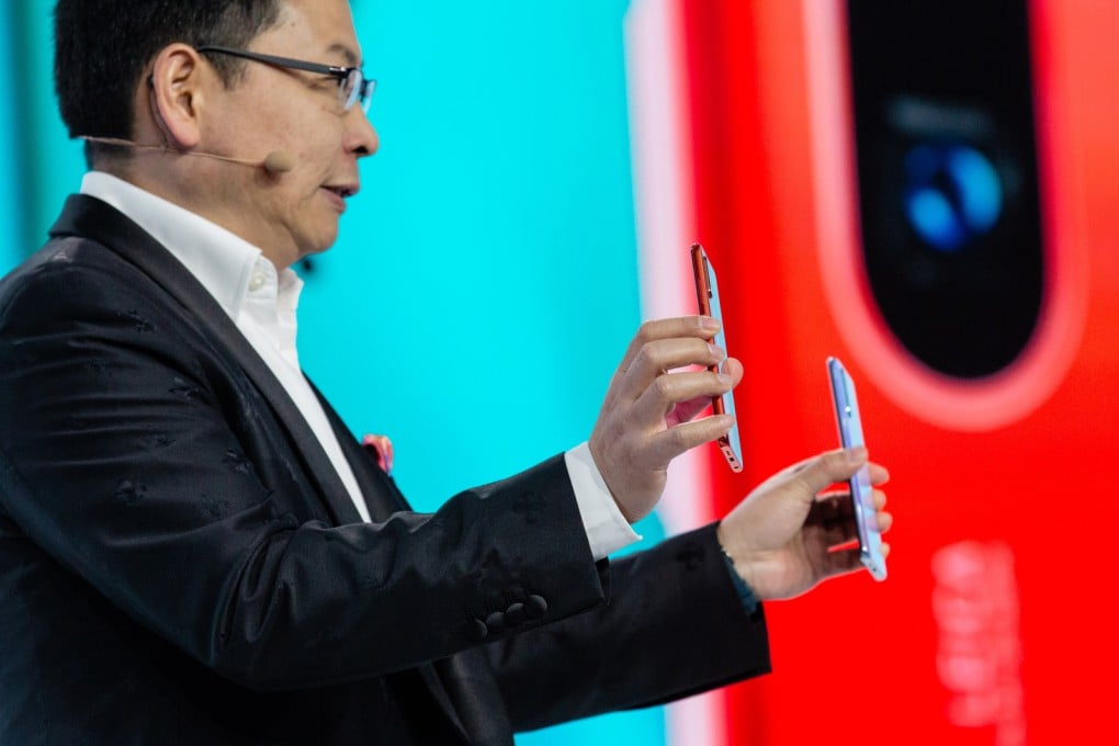 Huawei’s Richard Yu presents the P30 series during a launch event in Paris on March 26, 2019. (Picture: Marlene Awaad/Bloomberg)