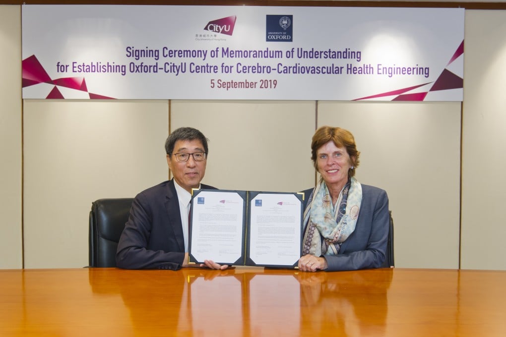 President Kuo (left) and Professor Richardson, Vice-Chancellor at Oxford, agreed to collaborate on health engineering.
