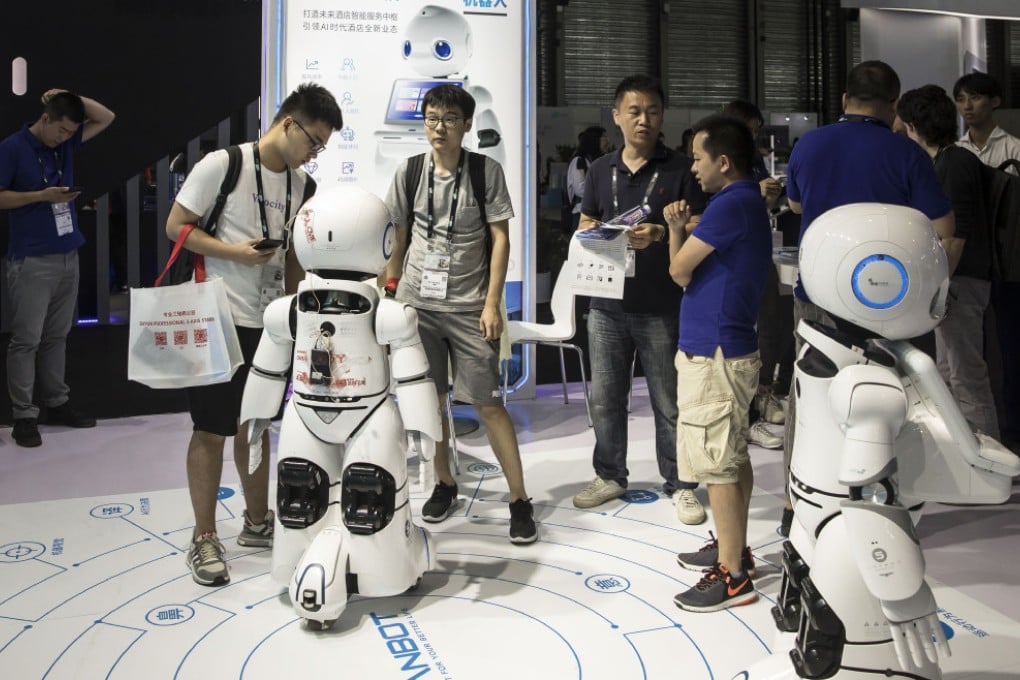 Hotel service robots on display at CES in Shanghai in June 2019. (Picture: Bloomberg)