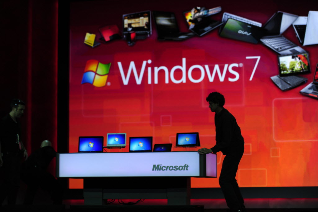 Laptop computers on display during a keynote speech by then-Microsoft CEO Steve Ballmer at CES 2011. (Picture: Robyn Beck/AFP)