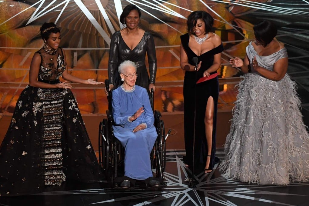 Katherine Johnson surrounded by actresses Janelle Monae, Taraji P. Henson and Octavia Spencer on stage at the 89th Oscars in 2017. (Picture: Mark Ralston/AFP Photo)