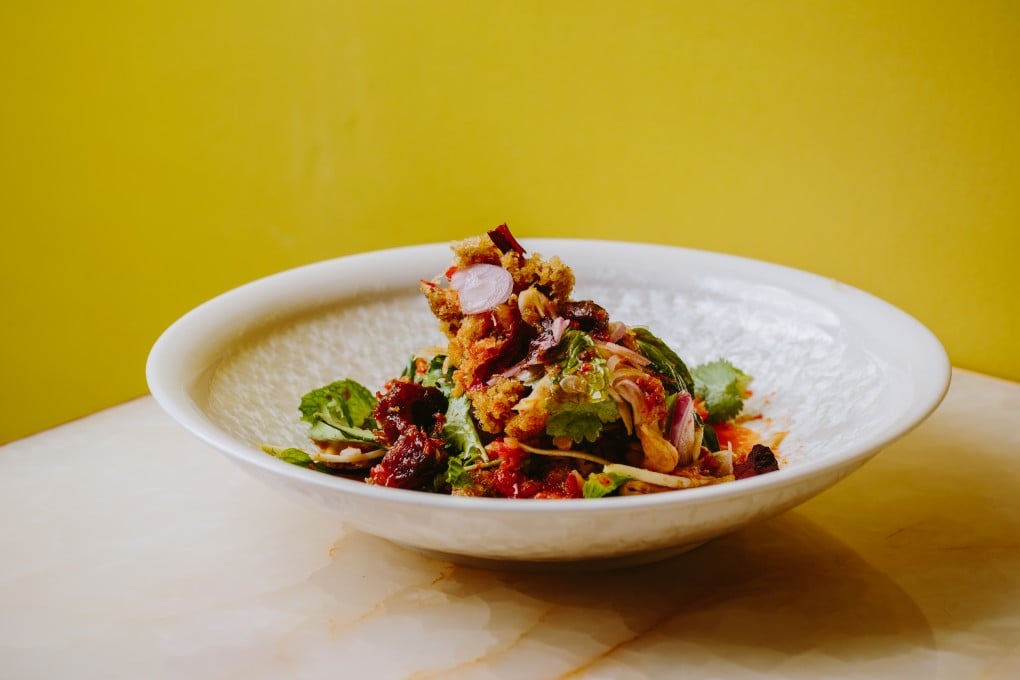 Crispy fish cake salad with green mango and sweet pork