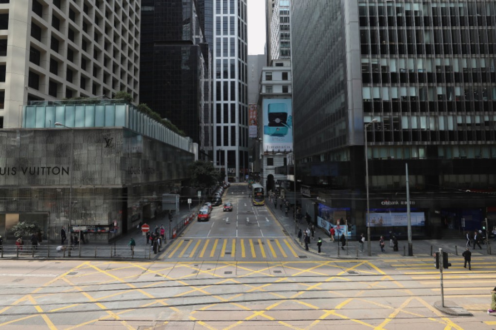 Even in Hong Kong’s central business district, few people are seen on the streets as lunch hour approaches because of the coronavirus epidemic. (Picture: SCMP)