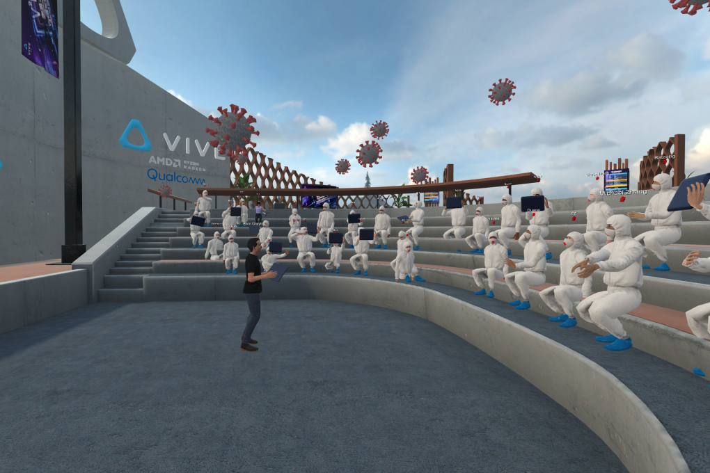 In one presentation about the coronavirus pandemic, virtual coronavirus particles were released, and participants found themselves dressed in protective suits. (Picture: HTC)